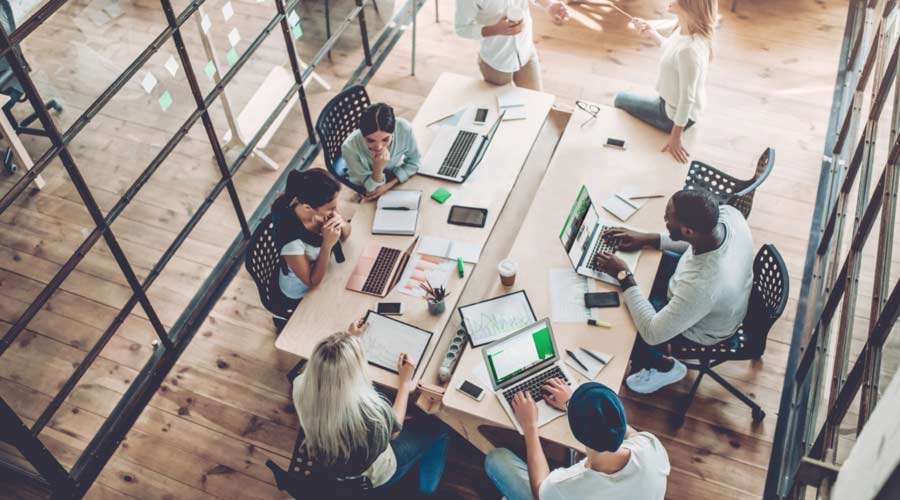 Young people work in modern office.